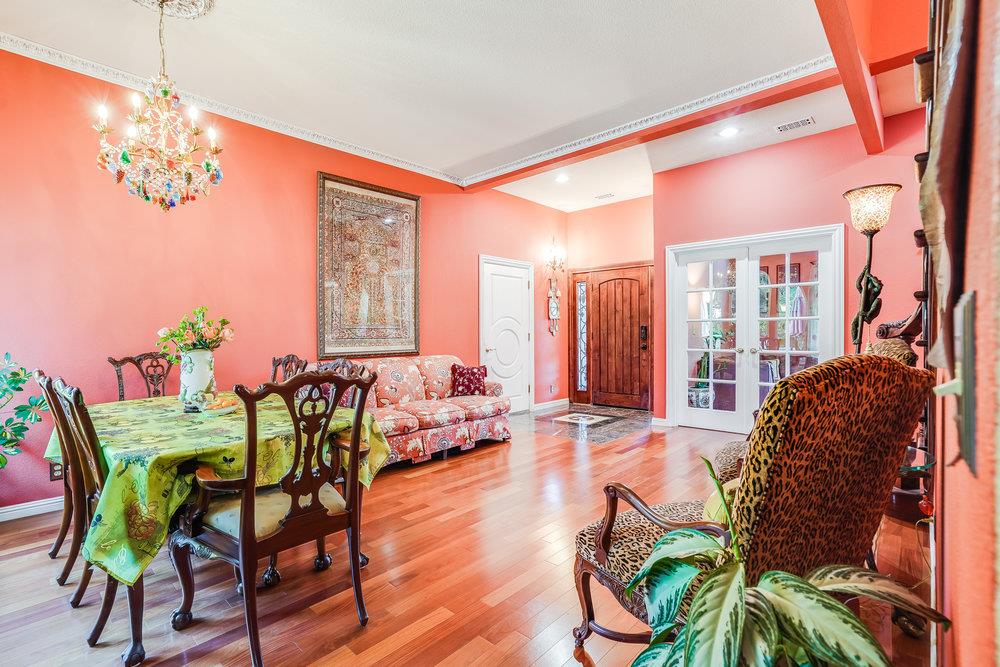 1893 Anthony Court Mountain View, CA 94040 - Photo 8 of 38 a living room filled with furniture and a wooden floor