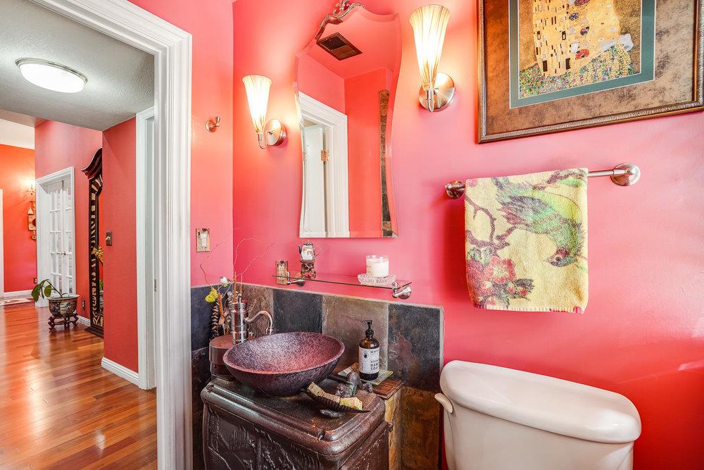 1893 Anthony Court Mountain View, CA 94040 - Photo 10 of 38 a bathroom with a toilet a sink and a mirror