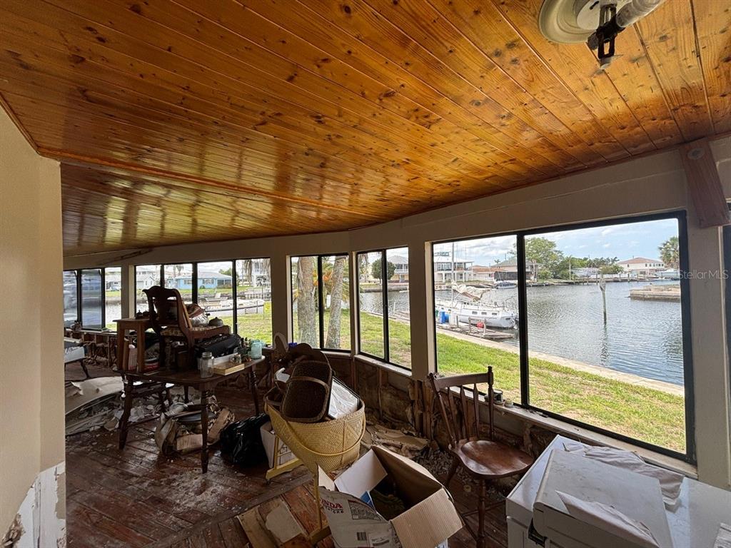 4447 Bahama Drive Hernando Beach, FL 34607 - Photo 15 of 31 a view of a dining room with furniture window and outside view