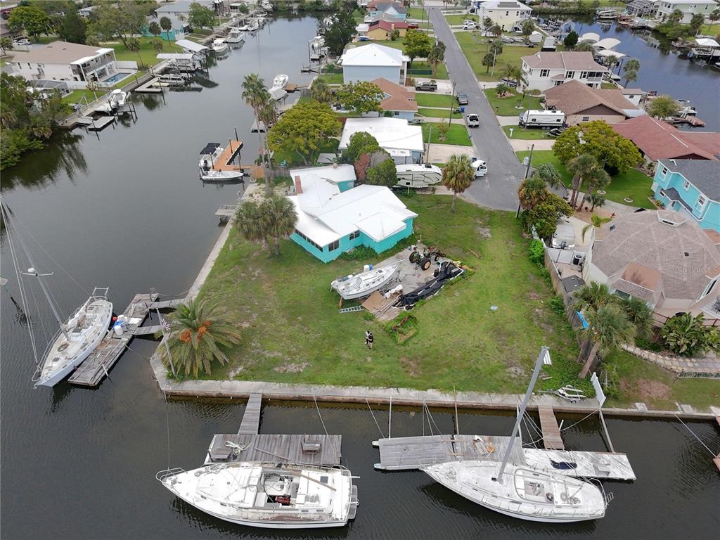 4447 Bahama Drive Hernando Beach, FL 34607 - Photo 29 of 31 an aerial view of a house with yard swimming pool and outdoor seating
