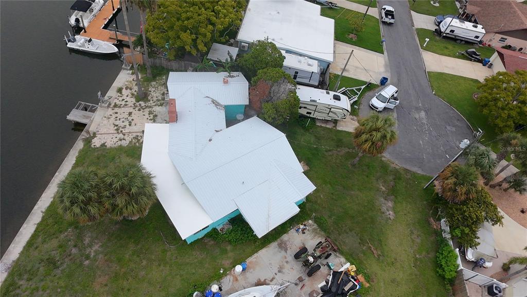 4447 Bahama Drive Hernando Beach, FL 34607 - Photo 31 of 31 an aerial view of a house with a yard