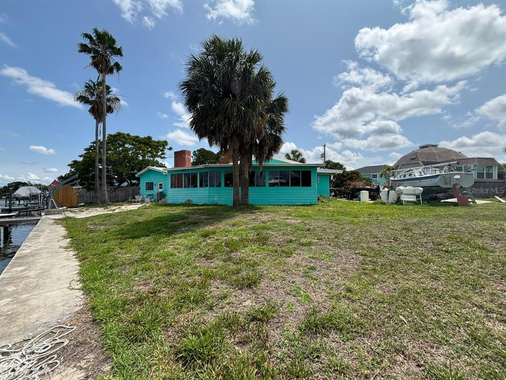 4447 Bahama Drive Hernando Beach, FL 34607 - Photo 5 of 31 a view of a park with large trees