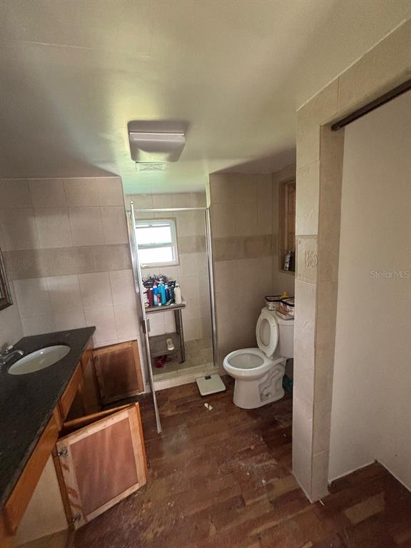 4447 Bahama Drive Hernando Beach, FL 34607 - Photo 8 of 31 a bathroom with a sink and a toilet