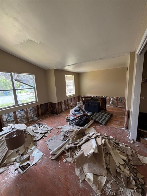 4447 Bahama Drive Hernando Beach, FL 34607 - Photo 9 of 31 a very nice looking room with a large window and couch