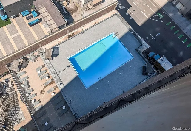 a view of a building with outdoor seating