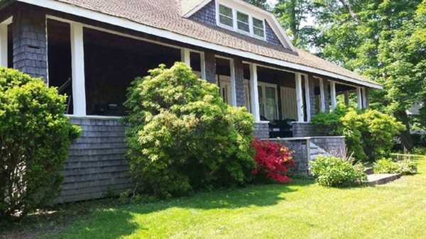 81 First Parish Road Scituate, MA 02066 - Photo 3 of 7 a front view of a house with garden