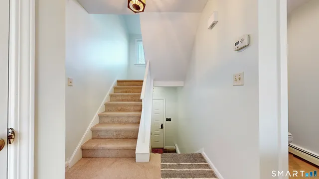 a view of an entryway with staircase