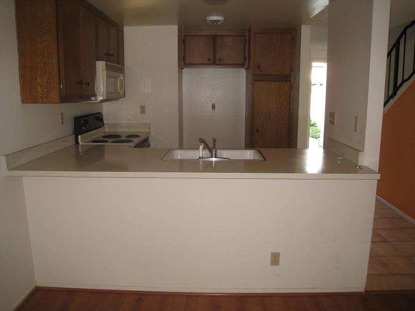 590 Mills Way Goleta, CA 93117 - Photo 3 of 5 a bathroom with a sink and a mirror