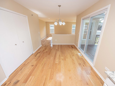 7 Boulder Ridge Court Bolingbrook, IL 60490 - Photo 23 of 44 a view of a room with wooden floor and windows