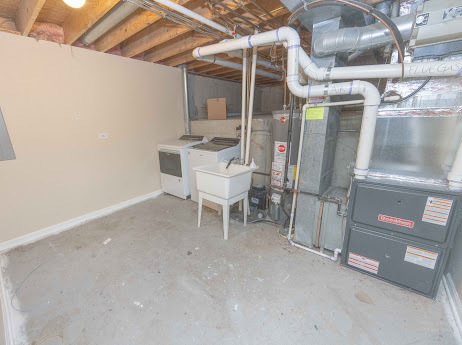 7 Boulder Ridge Court Bolingbrook, IL 60490 - Photo 29 of 44 a room with table and chairs