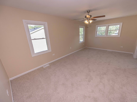 7 Boulder Ridge Court Bolingbrook, IL 60490 - Photo 33 of 44 an empty room with windows and closet