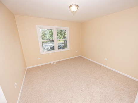 7 Boulder Ridge Court Bolingbrook, IL 60490 - Photo 38 of 44 an empty room with a window