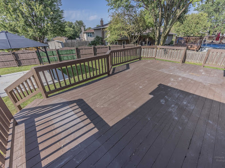 7 Boulder Ridge Court Bolingbrook, IL 60490 - Photo 41 of 44 a view of a wooden deck with a yard