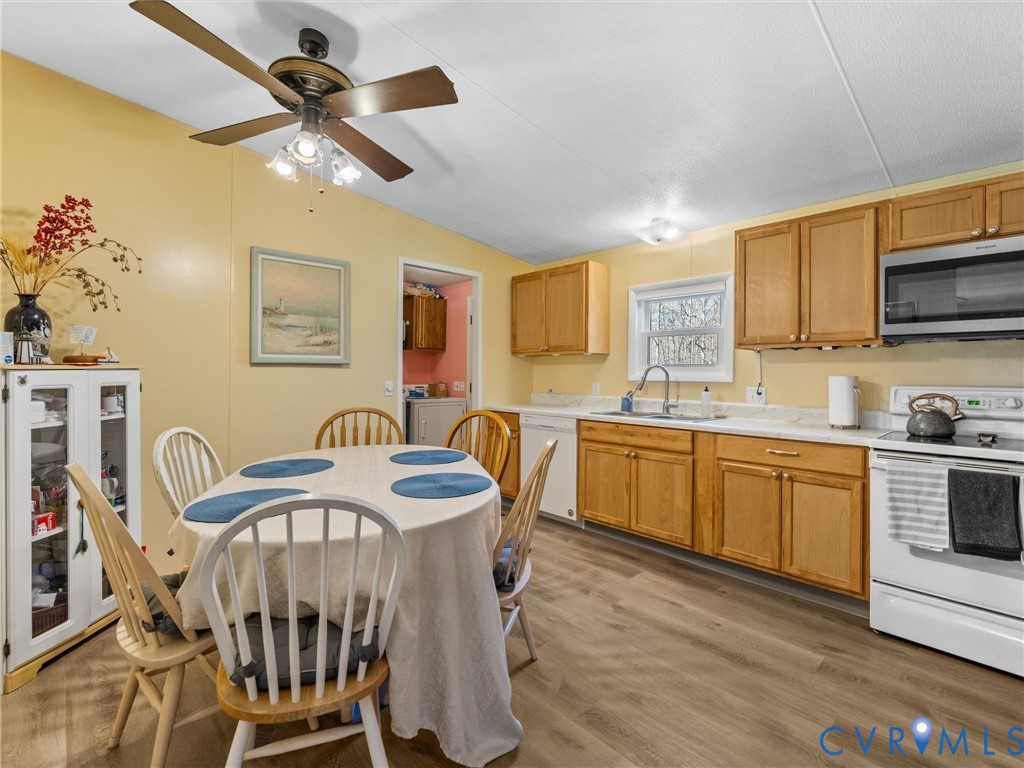 14181 Hopeful Road Montpelier, VA 23192 - Photo 6 of 39 The Eat-in Kitchen boasts LVP Flooring, Soft-Close