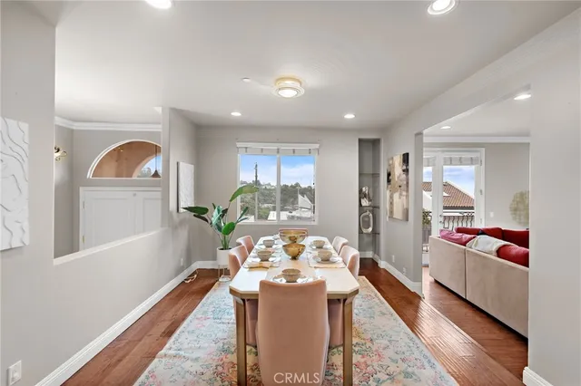 a view of a living room and dining room