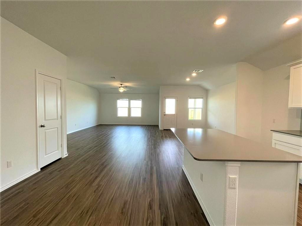409 Bluejack Way Hutto, TX 78634 - Photo 8 of 28 a view of livingroom and hardwood floor