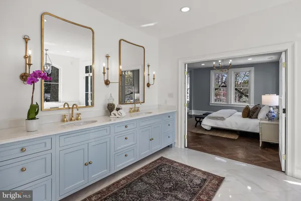 a front view of a house with a yard table and chairs