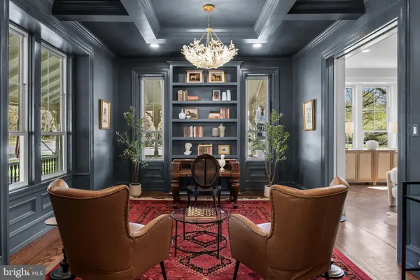 a dining room with furniture window wooden floor