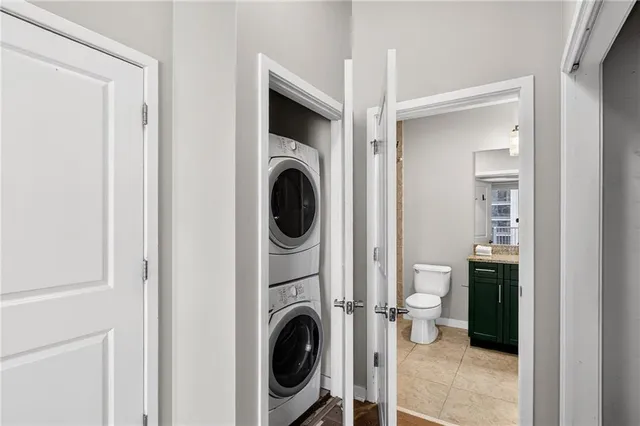 a view of a hallway with washer and dryer