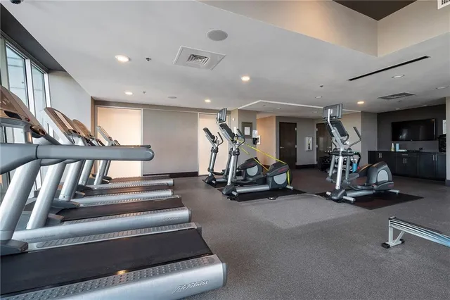 a room with furniture and pool table