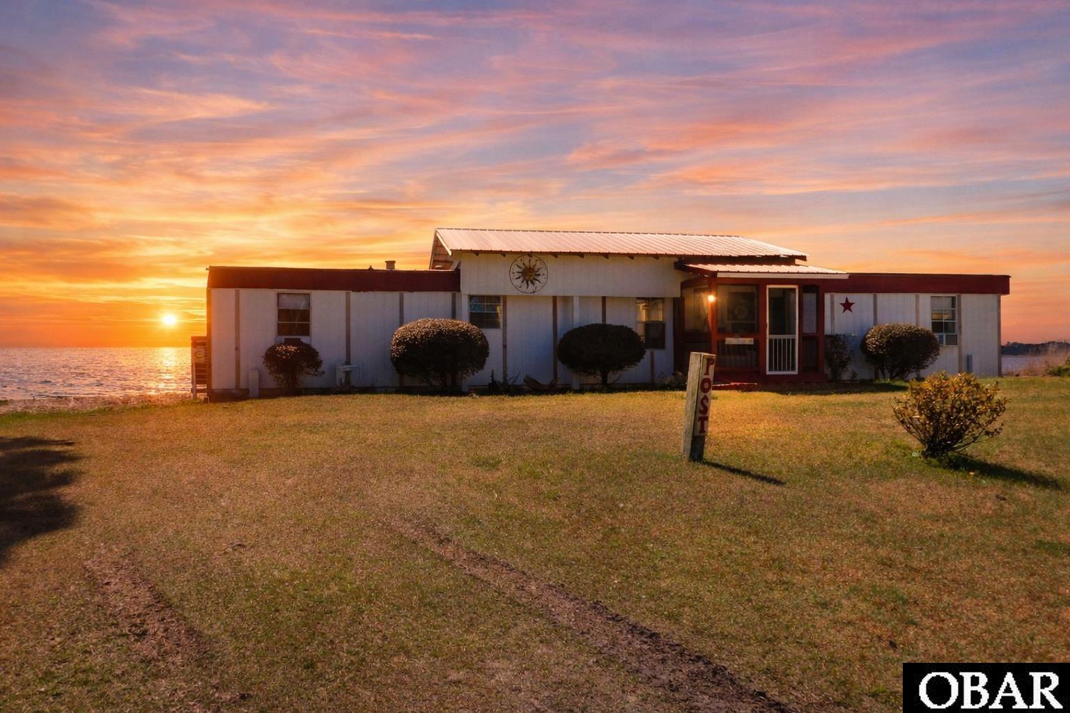 123 Bayview Drive Stumpy Point, NC 27978 - Photo 1 of 1 Soundfront Sunsets
