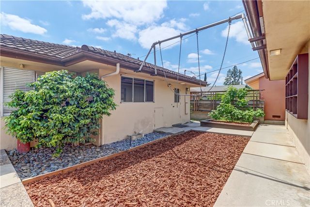 a backyard of a house with lots of green space