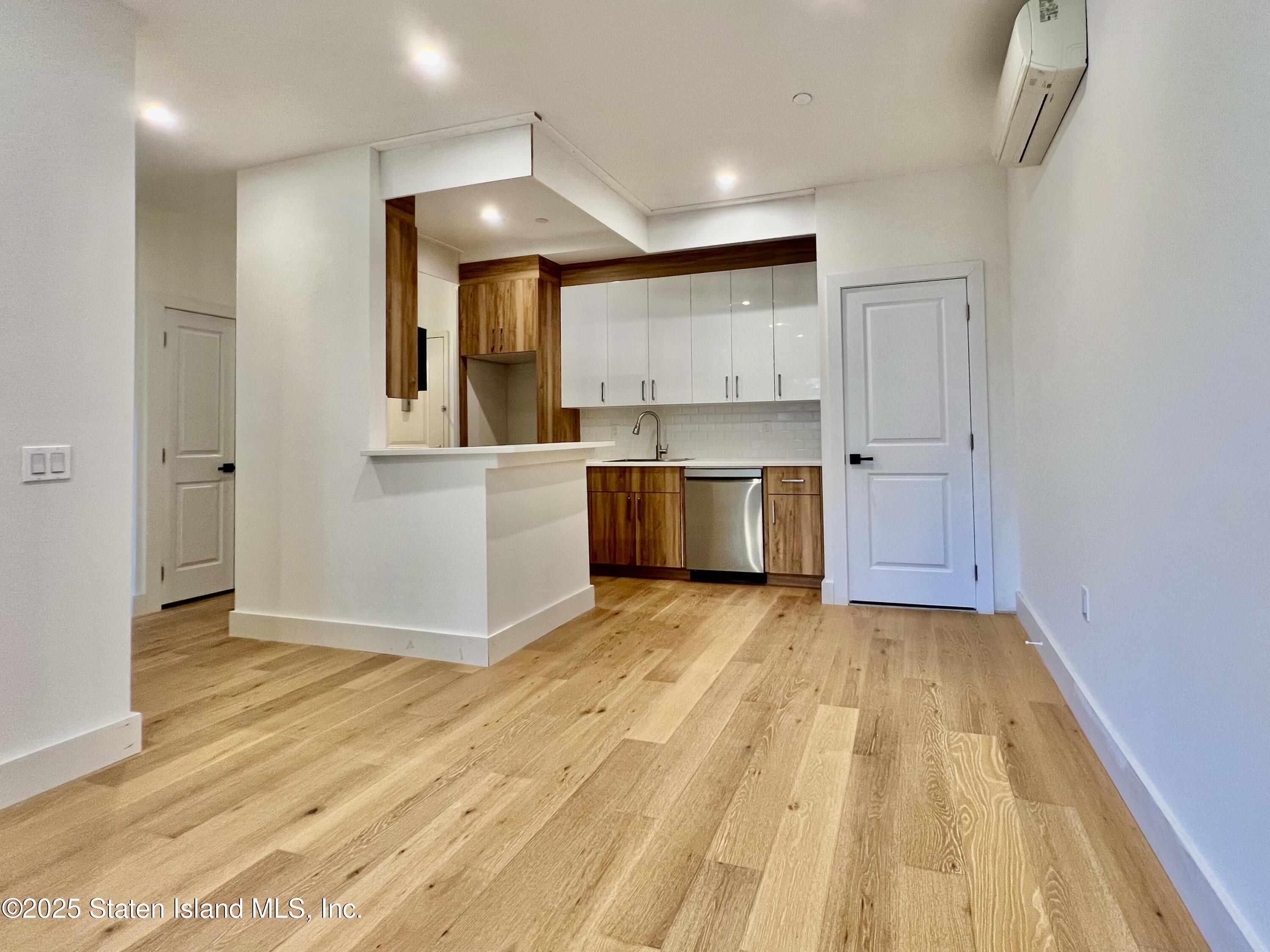 3865 Amboy Road, Unit 3D Staten Island, NY 10308 - Photo 14 of 36 a view of kitchen with wooden floor