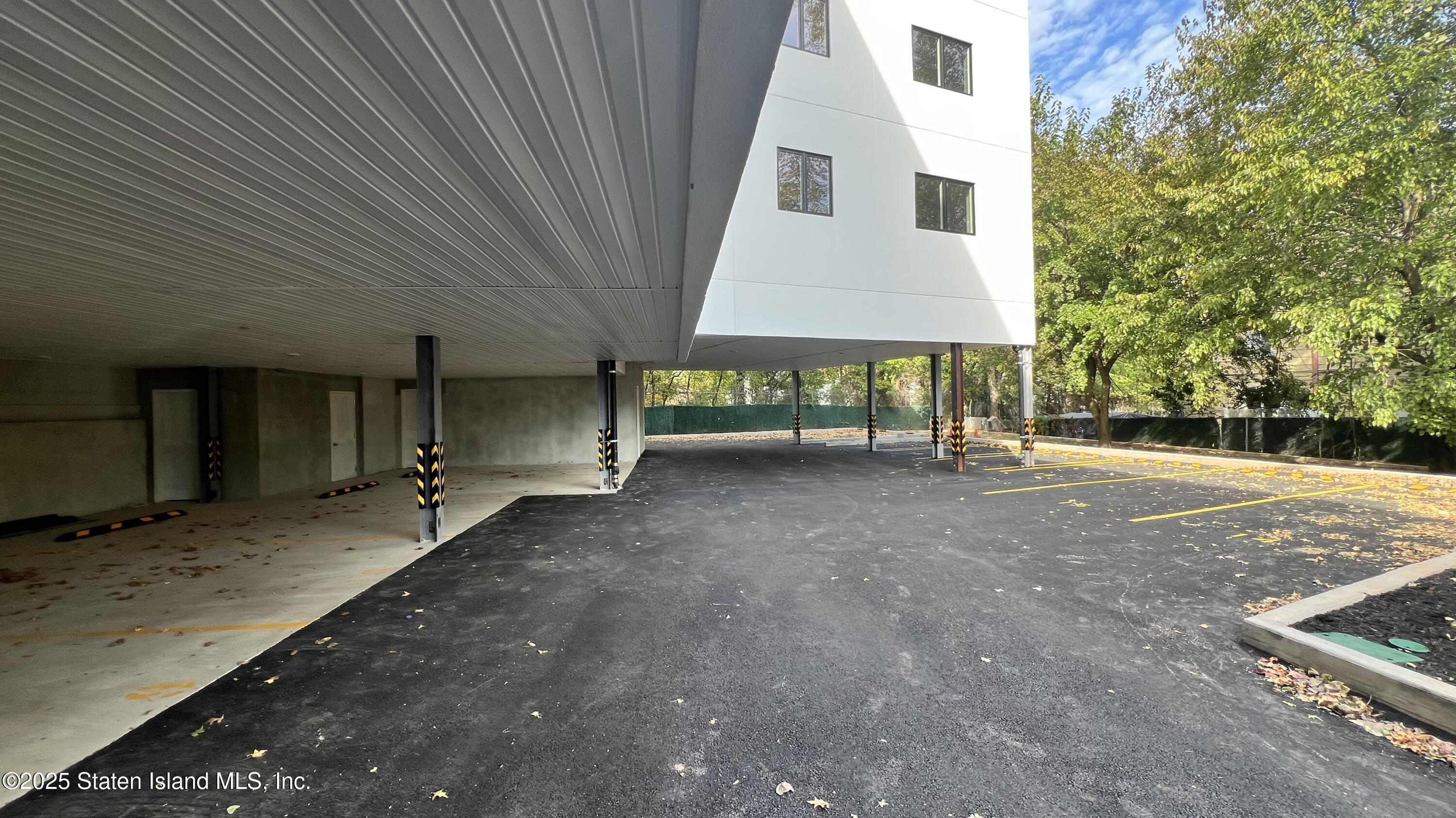 3865 Amboy Road, Unit 3D Staten Island, NY 10308 - Photo 34 of 36 a view of house with backyard and trees
