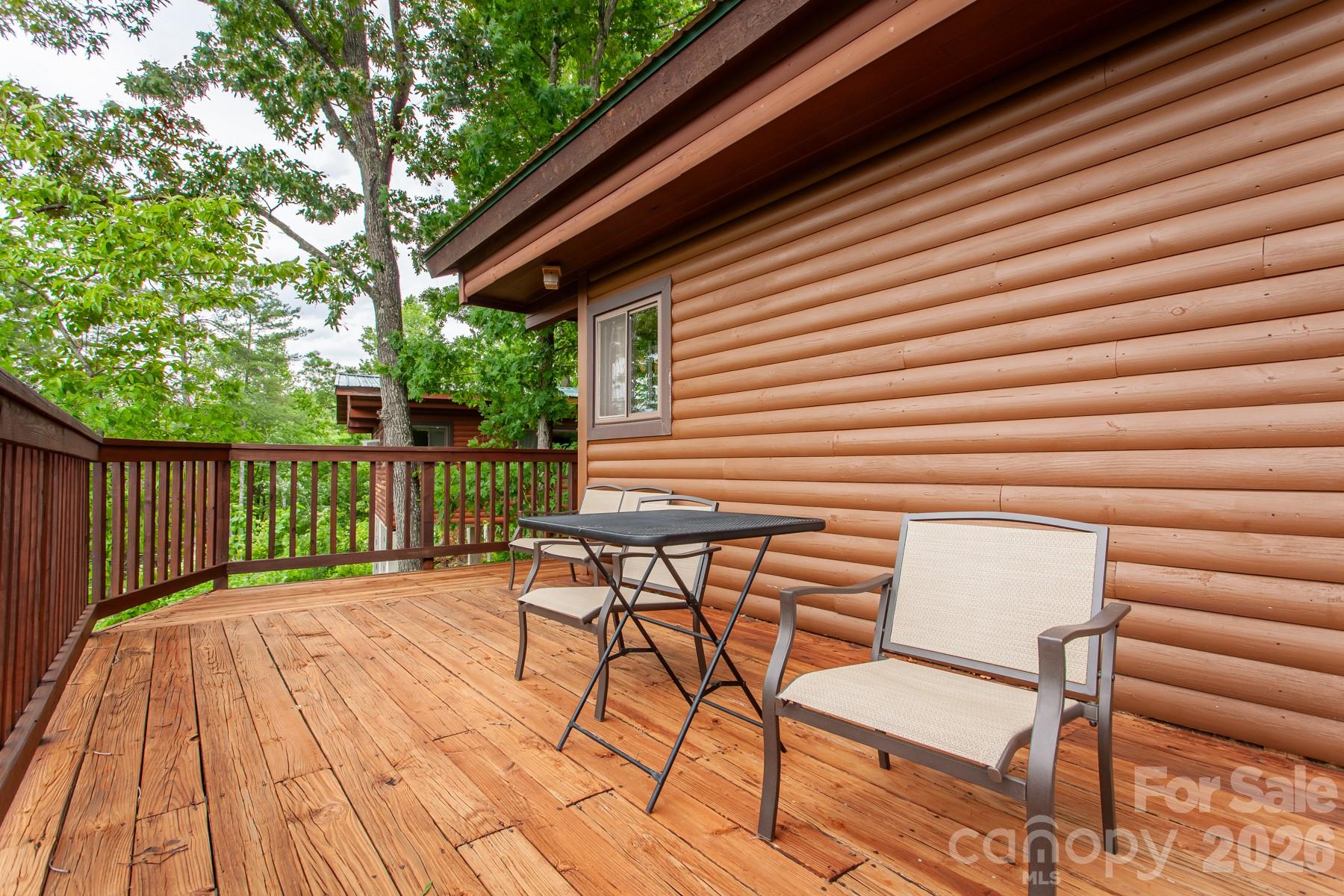 307 Blue Ridge Parkway Bryson City, NC 28713 - Photo 20 of 48 a view of a patio with wooden floor
