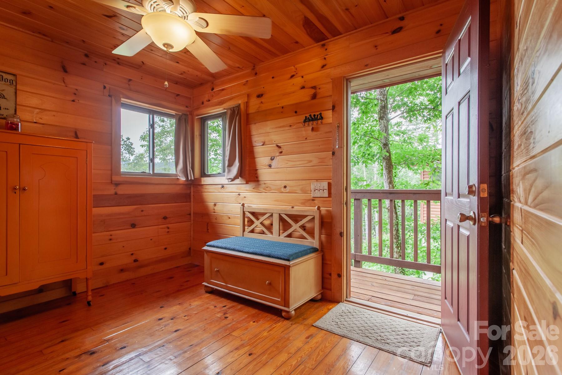 307 Blue Ridge Parkway Bryson City, NC 28713 - Photo 25 of 48 a view of a room with furniture and a chandelier