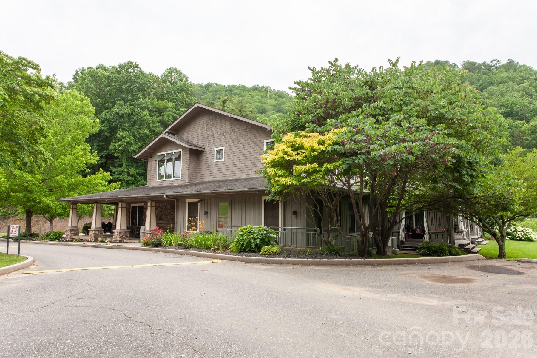 307 Blue Ridge Parkway Bryson City, NC 28713 - Photo 44 of 48 front view of a house with a street