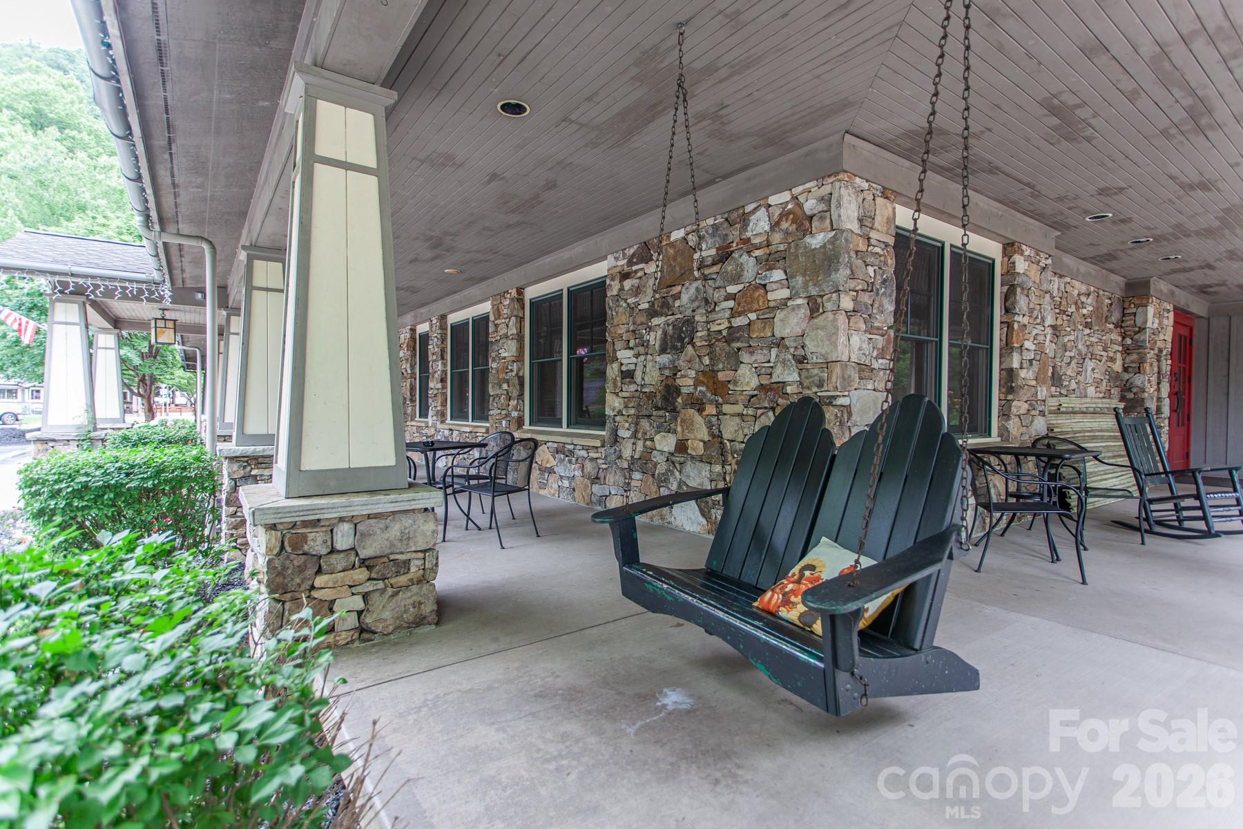 307 Blue Ridge Parkway Bryson City, NC 28713 - Photo 47 of 48 a building outdoor space with patio furniture and potted plants