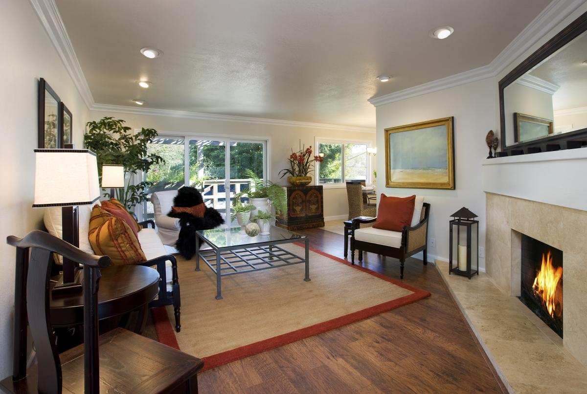 122 Hermosillo Road Santa Barbara, CA 93108 - Photo 1 of 6 a living room with furniture a fireplace and a flat screen tv
