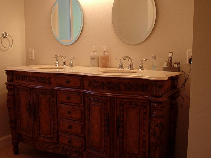 122 Hermosillo Road Santa Barbara, CA 93108 - Photo 4 of 6 a bathroom with a sink and a mirror