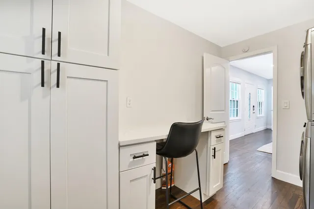 a view of entryway with wooden floor