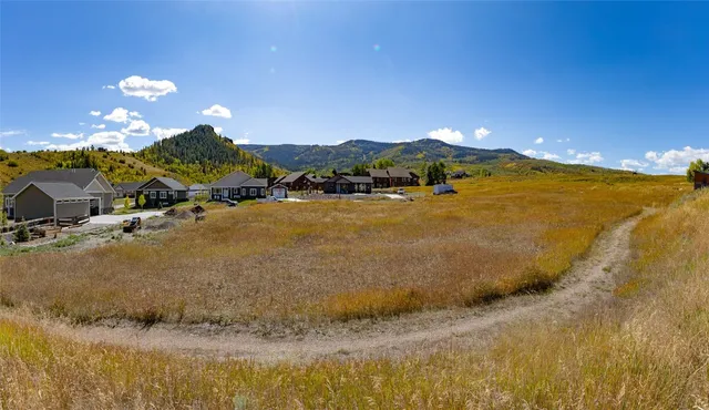 a view of a house with a ocean view