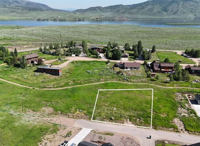 a view of a lake with a houses