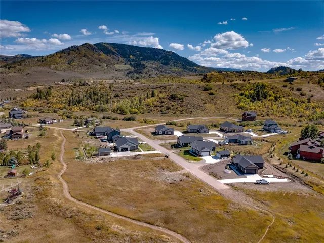 a view of a building with a mountain