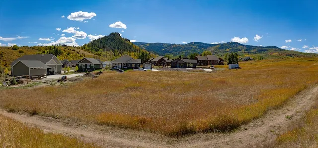 a view of a house with swimming pool