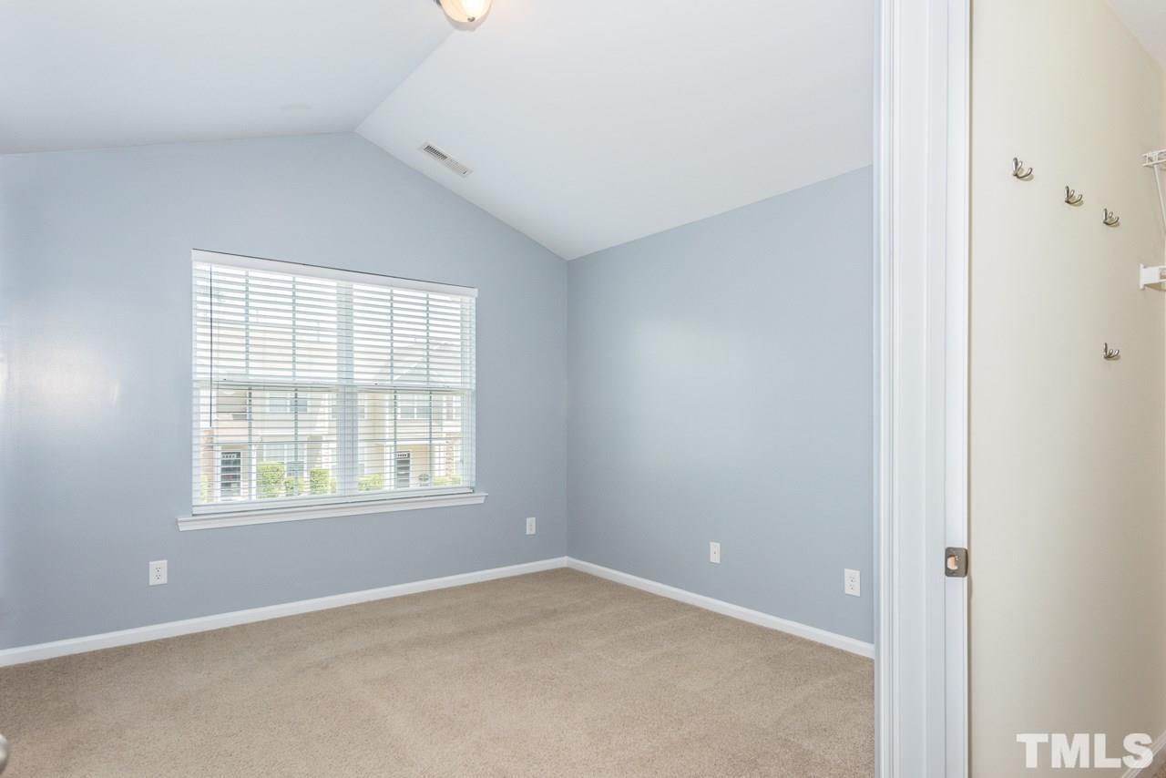 3535 Sugar Tree Place Durham, NC 27713 - Photo 8 of 8 an empty room with a window