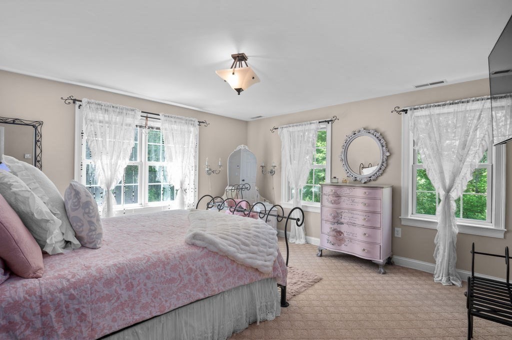 1 Timber Lane, Unit B Amesbury, MA 01913 - Photo 16 of 41 a bedroom with furniture and windows