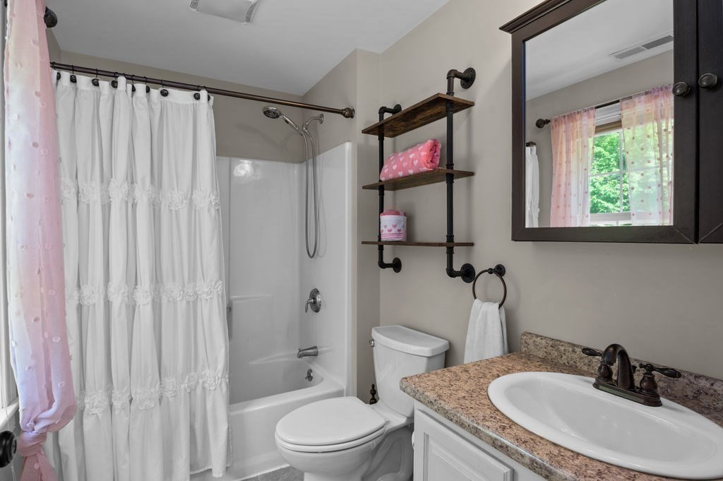 1 Timber Lane, Unit B Amesbury, MA 01913 - Photo 18 of 41 a bathroom with a sink toilet and shower