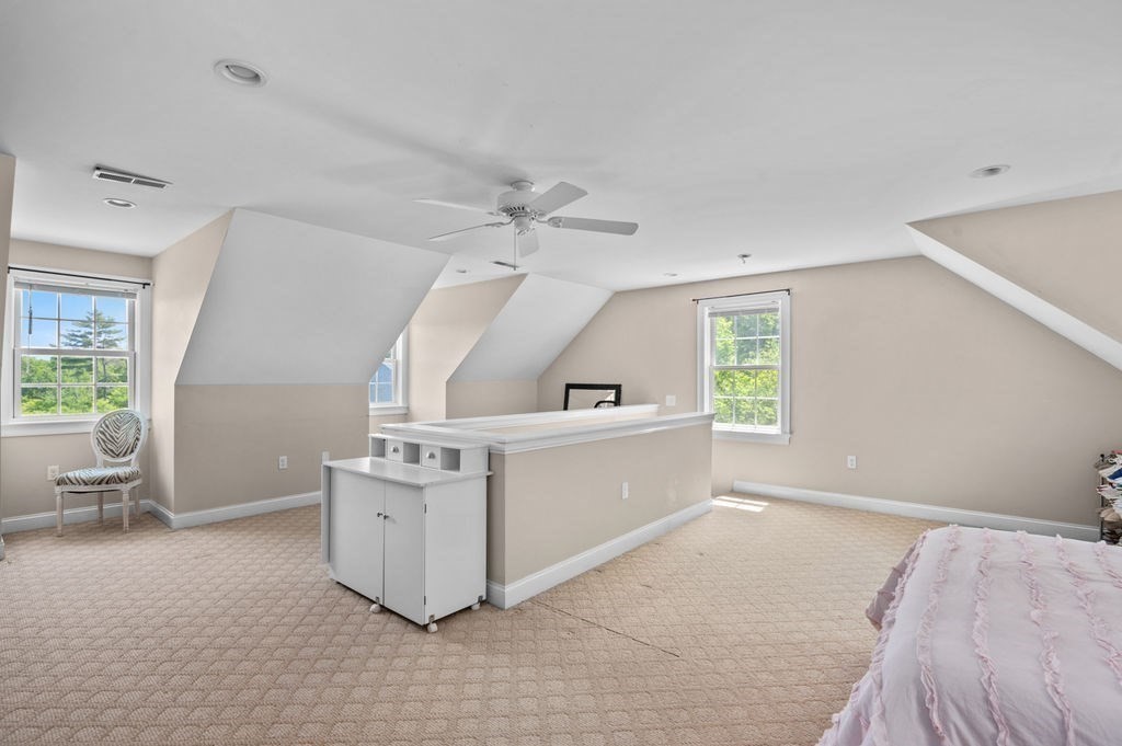 1 Timber Lane, Unit B Amesbury, MA 01913 - Photo 28 of 41 a view of a kitchen with furniture and a ceiling fan