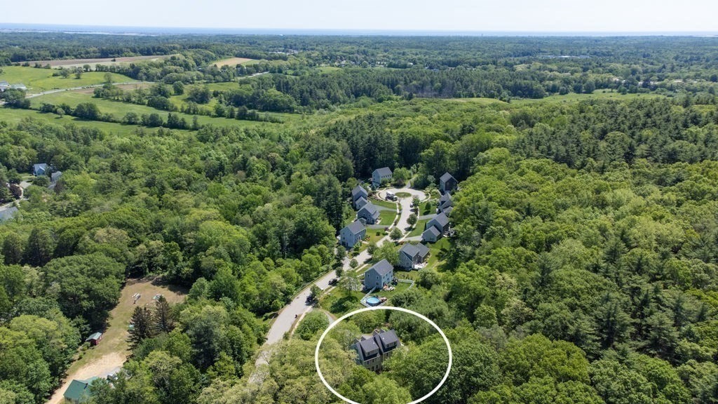 1 Timber Lane, Unit B Amesbury, MA 01913 - Photo 35 of 41 an aerial view of a house with a yard