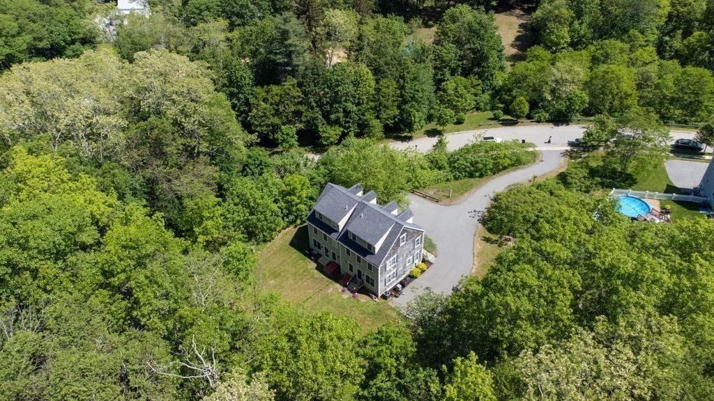 1 Timber Lane, Unit B Amesbury, MA 01913 - Photo 40 of 41 an aerial view of a house with outdoor space and street view