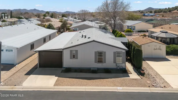 a view of a house with a street