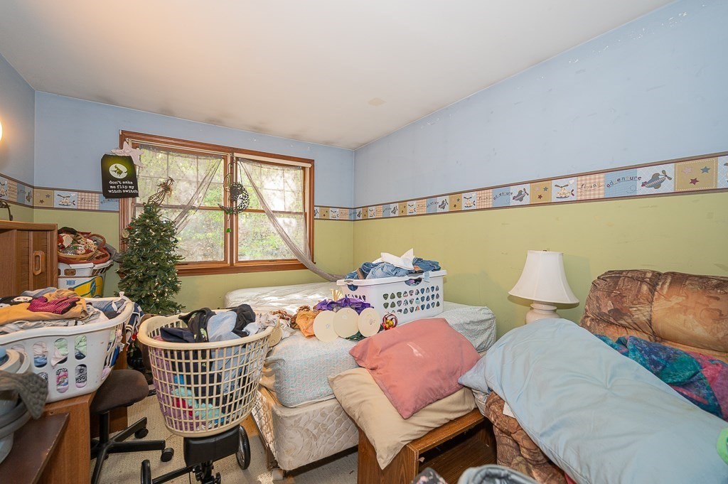 172 North Brookfield Road Oakham, MA 01068 - Photo 13 of 26 a living room with furniture and a window