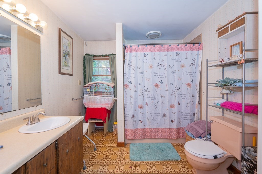 172 North Brookfield Road Oakham, MA 01068 - Photo 14 of 26 a bathroom with a sink toilet vanity and shower