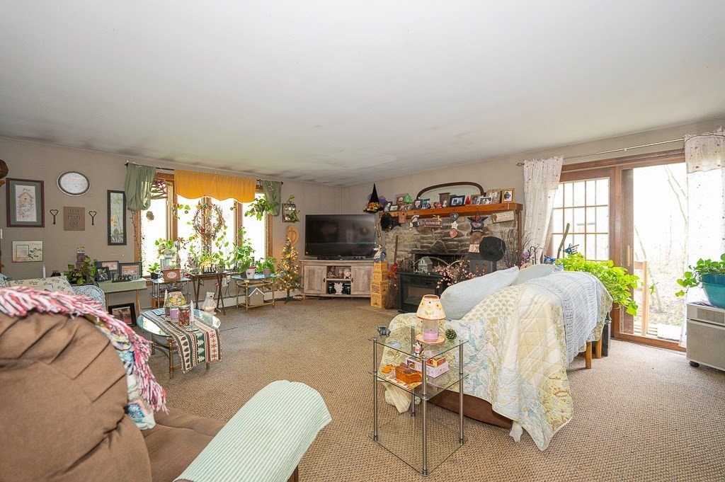 172 North Brookfield Road Oakham, MA 01068 - Photo 7 of 26 a bedroom with furniture and a large window