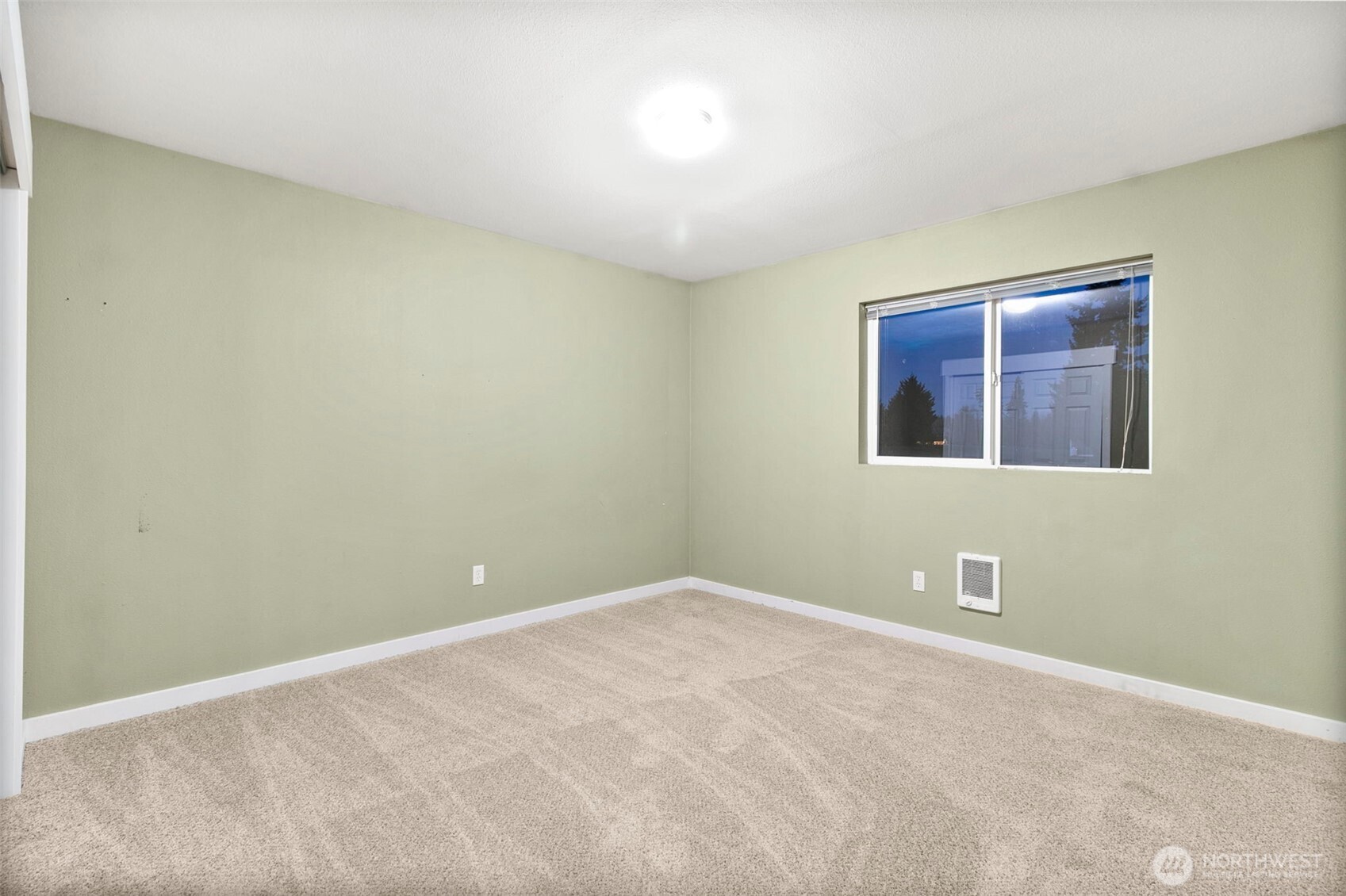 31619 26th Avenue East Graham, WA 98338 - Photo 39 of 40 a view of an empty room with a window